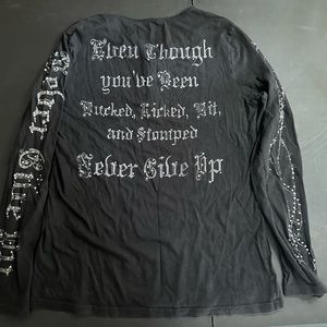 Cowgirl Tuff black bedazzled long sleeve shirt.